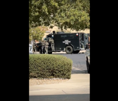 Armored Truck Pulled Up To A Neighborhood To Pick Up A Suspect And Turned Into A War Quick