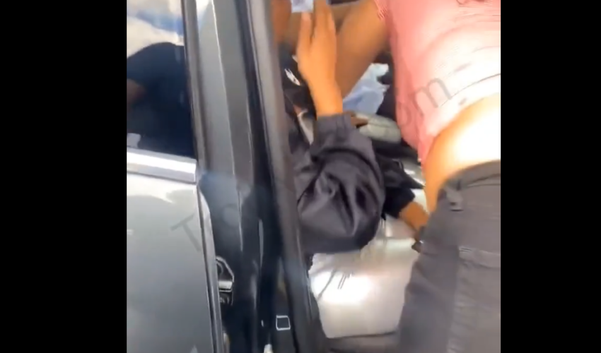Woman Tried To Help Her Friend By Putting A Girl Out Her Boyfriend Car, After She Had A Gun And Refuse To Leave Because She Wanted Her Boyfriend To Take Her Home And The Boyfriend Had No Problem With It
