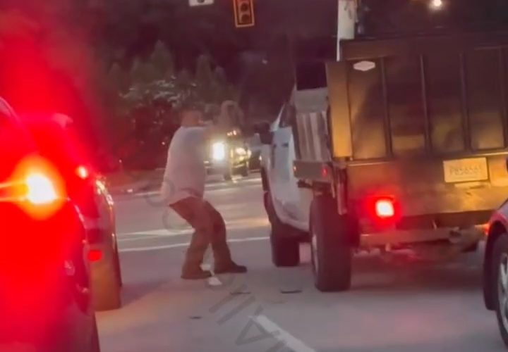 Dude Tried To Take Off A Man Work Truck Mirror During A Road Rage
