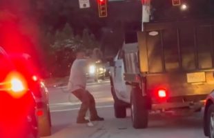 Dude Tried To Take Off A Man Work Truck Mirror During A Road Rage