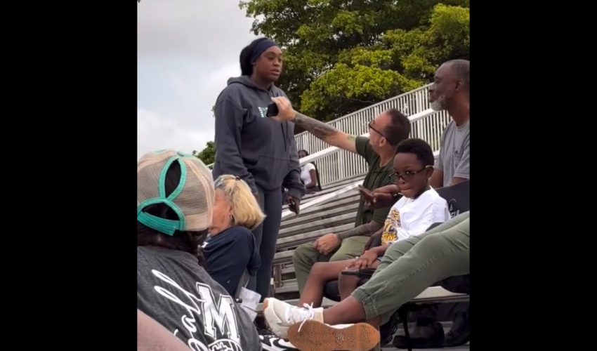 Mother Goes Off On A Guy That Put His Hands In Her Son Face During His Football Game And Everybody In The Crowed Was Against Her For Telling Him