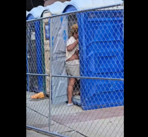 Woman Walked In On A Another Woman In A Porta Toilet And Started Swinging For Stealing Her Money
