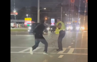 Dekalb Police Officer Goes One On One With A Man In The Streets While Trying To Detain Him