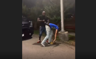 Security Guard Give Man A Wedgie After He Tried To Swing On Him When He Was Told To Leave
