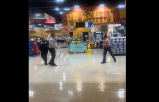 Security Guard Cracks A Man With A Chair After He Kept Trying To Put Hands On His Coworker After He Was Told To Leave The Store