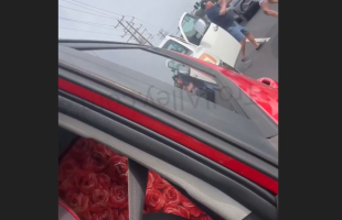 Man Handles A Woman During A Road Rage