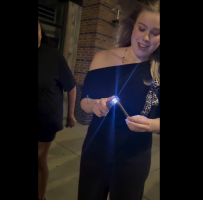 Girl Uses A Taser To Light A Black And Mild