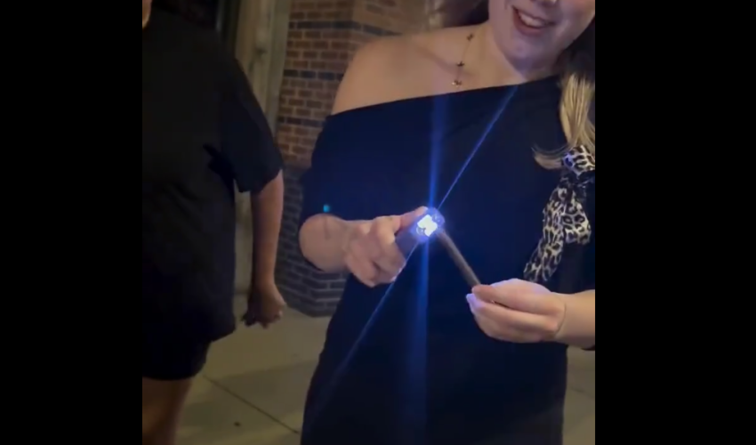 Girl Uses A Taser To Light A Black And Mild