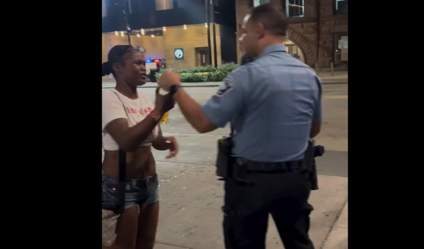 Woman Still Tries To Drink Liquor After Police Poured It Out In Front Of Her