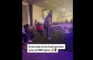 Street Dude In A Crowd Throws Hands With A MMA Fighter For Looking At Him