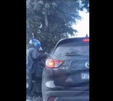 Two Men On A Motorcycle Tried Rob Somebody In Traffic