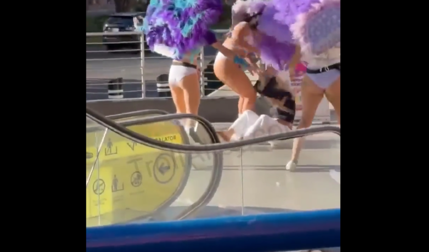Black Man Gets Mad After A Guy Put Hands On 3 Girls Because His Girlfriend Was Getting Jumped By 3 Girls On The Hollywood Strip